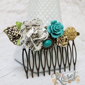Teal & gold hair comb featuring a white book page